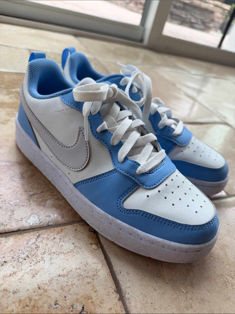 Nike light blue and white size 39